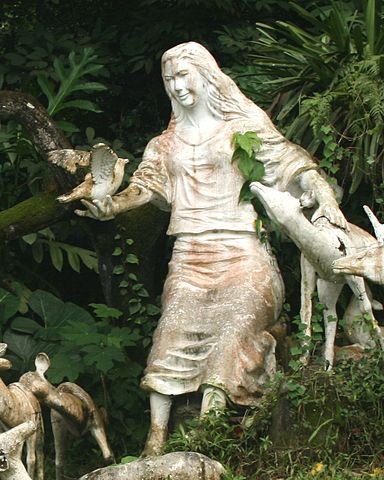 Mariang Makiling statue standing among the animals she is believed to be the gaurdian of.