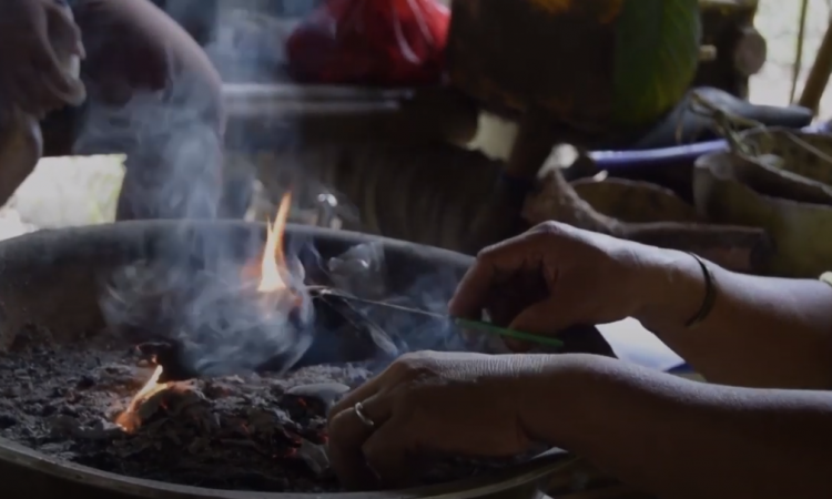 a healer concocts a fire with smoke