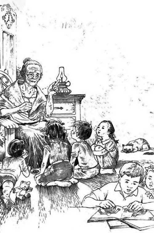 A lola sits by candle light telling young children a story.